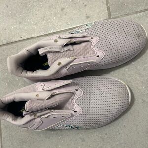women well worn reebok Purple Slip-On Sneakers